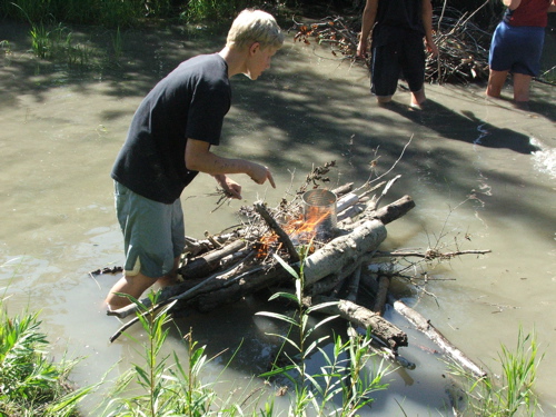 Boiling an egg in the river